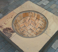 bowel carved out of stone blocks