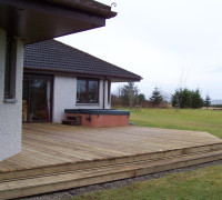Large decking area with hot tub