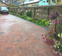 Paved red brick driveway