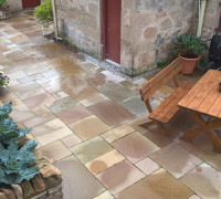Natural Stone Walling planters with paved patio