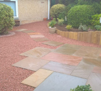 Red Stone paving slabs with wooden planter
